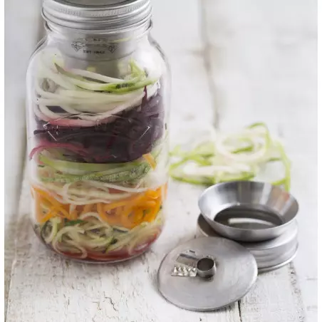 raw vegetable spaghetti original shape on the plate manual spiralizer