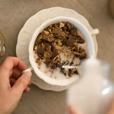 bowl of organic gluten-free and no added sugar cocoa muesli cereal