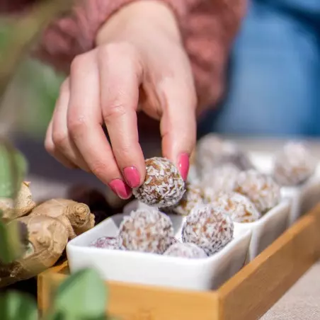 Energy ball with ginger and raw coconut, organic, vegan, healthy