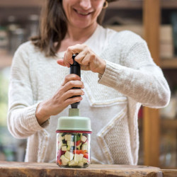 Vacuum sealing a jar of ratatouille for cooking