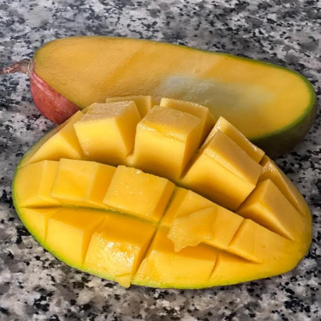 cutting an organic mango