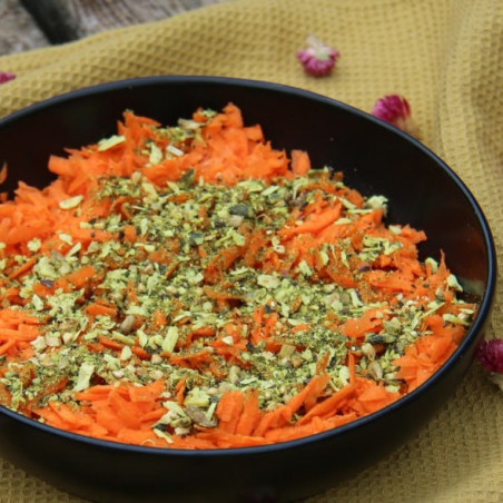 Grated carrot salad with tiger nuts, hemp, buckwheat, seaweed, and spices